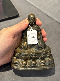 A Tibetan bronze Padmasambhava, 14th C.