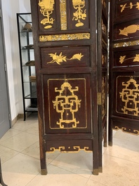 A Chinese four-part reticulated and partially gilt wooden folding screen, 19th C.
