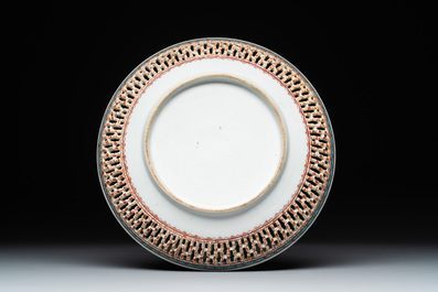 A Chinese famille rose reticulated border 'birds among flowering branches' plate, Qianlong