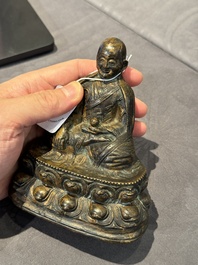 A Tibetan bronze Padmasambhava, 14th C.