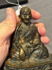 A Tibetan bronze Padmasambhava, 14th C.