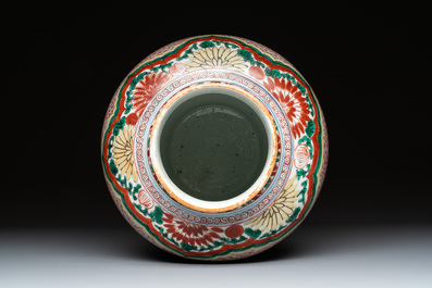 A Chinese wucai 'Buddhist lion and peony scroll' vase, Transitional period