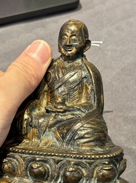 A Tibetan bronze Padmasambhava, 14th C.