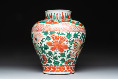 A Chinese wucai 'Buddhist lion and peony scroll' vase, Transitional period