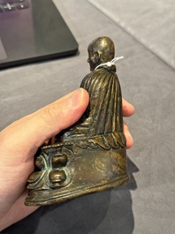 A Tibetan bronze Padmasambhava, 14th C.