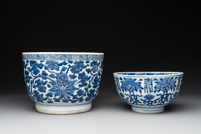 A Chinese blue and white 'lotus' jardini&egrave;re, a 'peony' dish and a 'shou' bowl, Kangxi