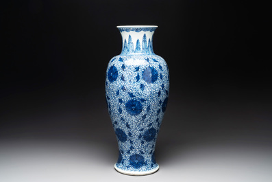 A Chinese blue and white 'chrysanthemum scroll' baluster vase, Kangxi