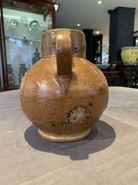 A globular stoneware jug with three coat of arms medallions, Germany, 16th C.