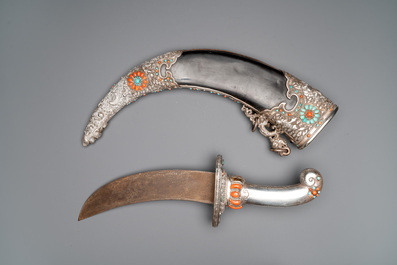 A large Tibetan coral- and turquoise-inlaid silver dagger, 19th C.