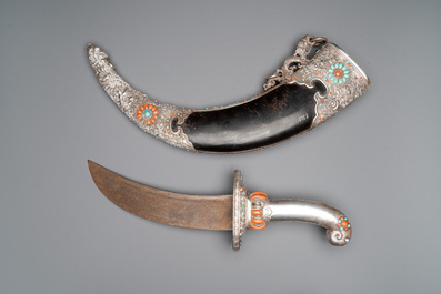 A large Tibetan coral- and turquoise-inlaid silver dagger, 19th C.