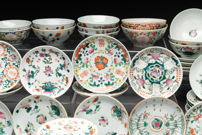 An impressive collection of 53 Chinese famille rose saucers, dishes and bowls, 19th C.