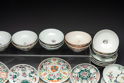 An impressive collection of 53 Chinese famille rose saucers, dishes and bowls, 19th C.