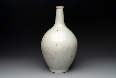 A pale celadon-glazed vase, a jar and a ewer, Asia, 19th C and later
