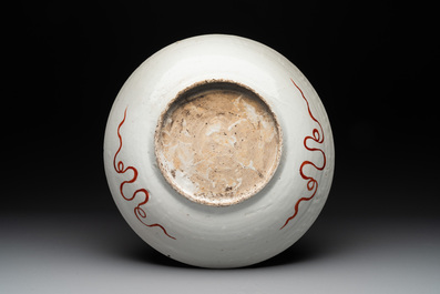 A Chinese Swatow green-enamelled dish with inscriptions for the Islamic market, Ming