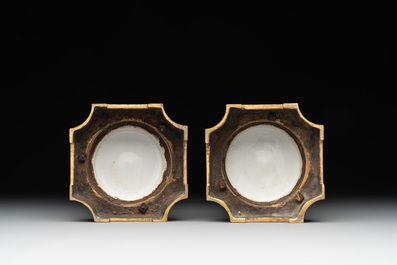 A pair of Chinese famille rose gilt-bronze-mounted 'birds among flowering branches' vases, 19th C.