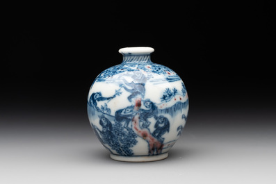 A Chinese blue, white and copper-red 'monkeys' snuff bottle, Yongzheng mark, 19th C.