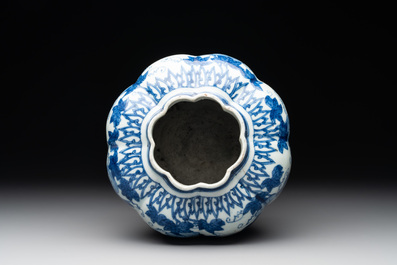 A Chinese blue and white 'fruiting vines and a squirrel' melon-shaped  jar, Ming