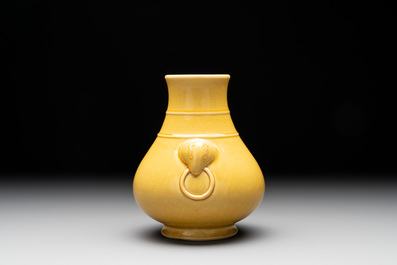 A Chinese yellow-glazed 'hu' vase, Qianlong mark, 19/20th C.