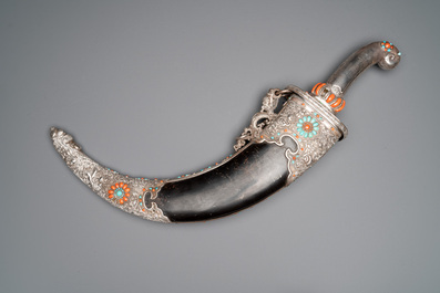 A large Tibetan coral- and turquoise-inlaid silver dagger, 19th C.