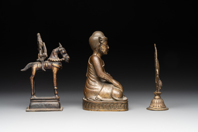 A Burmese gilt bronze Buddha, an Indian bronze Shiva on horseback and and a Nepalese Melong ritual mirror with Ganesh, 18/19th C.
