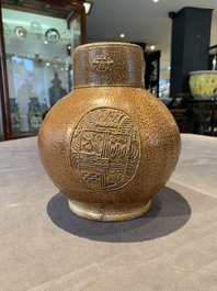 A globular stoneware jug with three coat of arms medallions, Germany, 16th C.
