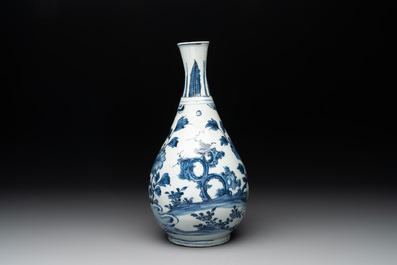 A Chinese blue and white 'birds among flowering branches' bottle vase, Ming