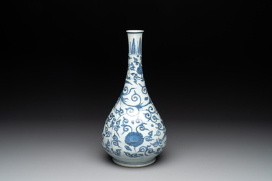 A Chinese blue and white 'phoenix and flower scroll' bottle vase, Ming