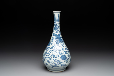 A Chinese blue and white 'phoenix and flower scroll' bottle vase, Ming