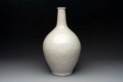 A pale celadon-glazed vase, a jar and a ewer, Asia, 19th C and later