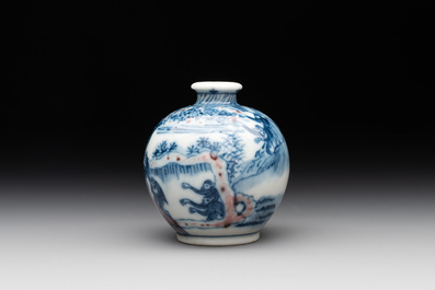 A Chinese blue, white and copper-red 'monkeys' snuff bottle, Yongzheng mark, 19th C.
