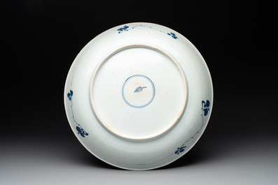 A Chinese blue and white 'lotus' jardini&egrave;re, a 'peony' dish and a 'shou' bowl, Kangxi