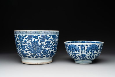 A Chinese blue and white 'lotus' jardini&egrave;re, a 'peony' dish and a 'shou' bowl, Kangxi