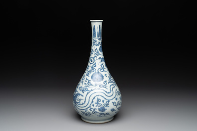 A Chinese blue and white 'phoenix and flower scroll' bottle vase, Ming