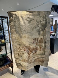 A Japanese embroidered silk wall tapestry with two tigers, Meiji, 19th C.