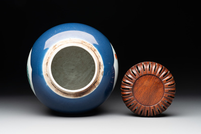 A fine Chinese blue-ground famille rose 'quails and peonies' jar and wooden cover, Qianlong
