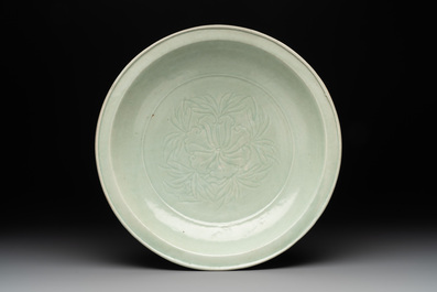 Three Chinese celadon dishes with floral design, Ming and later