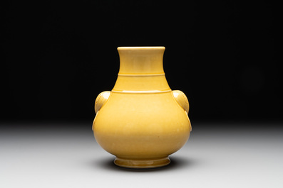 A Chinese yellow-glazed 'hu' vase, Qianlong mark, 19/20th C.