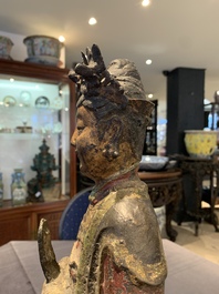A large Chinese polychrome-lacquered and gilt bronze Daoist immortal, 17th C.
