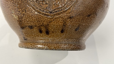 A globular stoneware jug with three coat of arms medallions, Germany, 16th C.