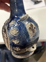 A Westerwald stoneware pilgrim's flask with the coat of arms of France, Germany, 17th C.