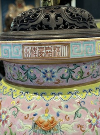 A large and impressive Chinese famille rose 'bajixiang and lotus scroll' censer with a wooden cover, Jiaqing mark and of the period