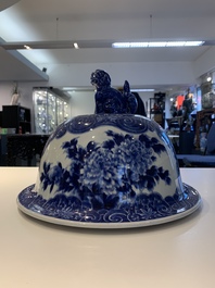 A massive Japanese blue and white Arita vase and cover with an eagle, a shishi and cub, 19th C.