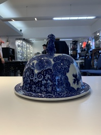 A massive Japanese blue and white Arita vase and cover with an eagle, a shishi and cub, 19th C.