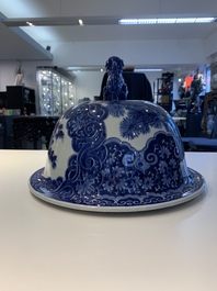 A massive Japanese blue and white Arita vase and cover with an eagle, a shishi and cub, 19th C.