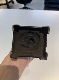 A fine Chinese bronze Luohan holding a sutra, Ming
