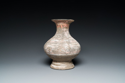 A Chinese polychrome painted pottery vase, Han