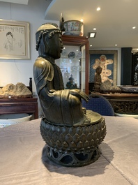 A Chinese bronze Bodhisattva on a lotus throne, Ming