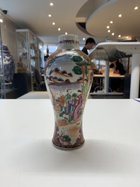 A Chinese famille rose 'mandarin subject' garniture of three vases, Qianlong