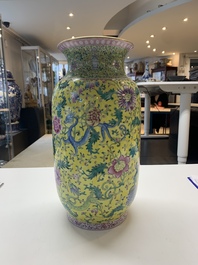 A pair of Chinese famille rose yellow-ground 'dragon' vases, Qianlong mark, Republic