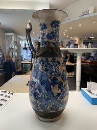 A pair of Chinese Nanking blue and white crackle-glazed 'phoenix' vases, 19th C.